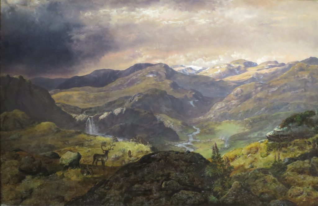 painting of mountains and caribou