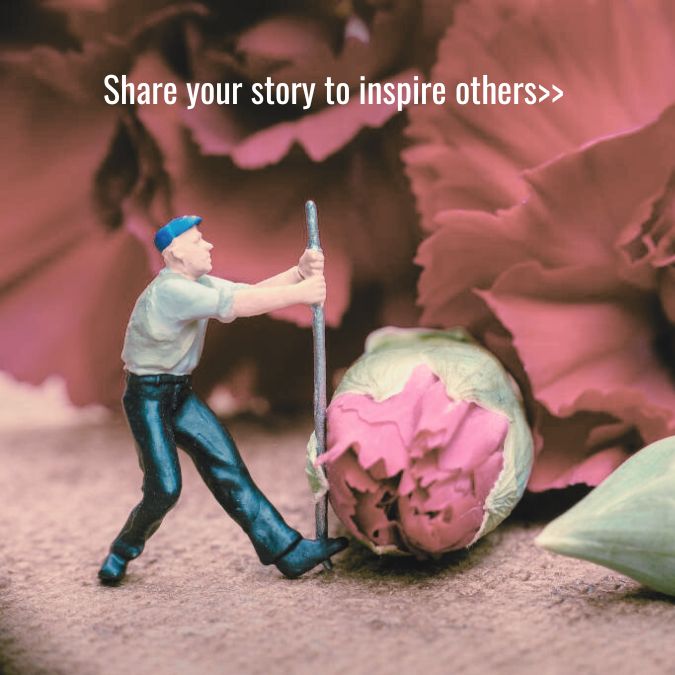 miniature model figure prying open a carnation and the text "share your story to inspire others"